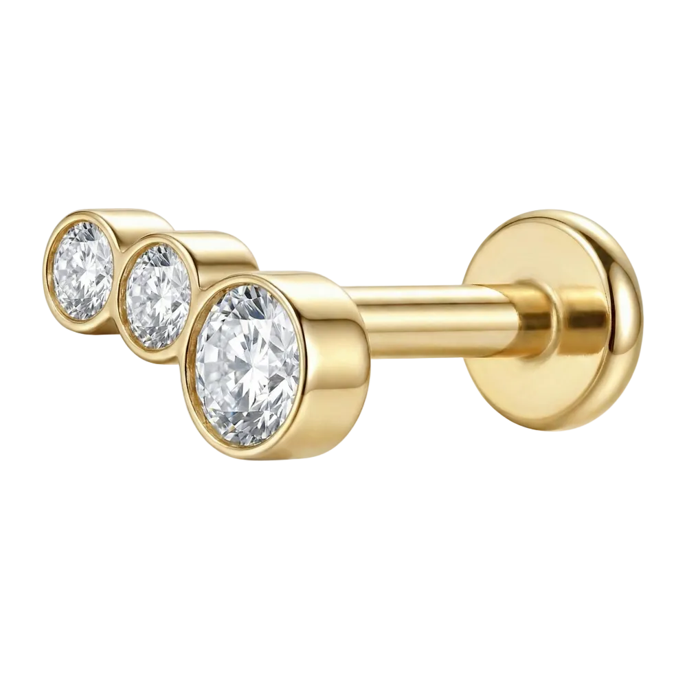 Labret decorativo de titanio con tres circonitas cúbicas