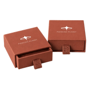 Geschenkbox mit dem Piercing-Planet-Logo